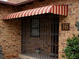Reboss profile awning installed over a window
