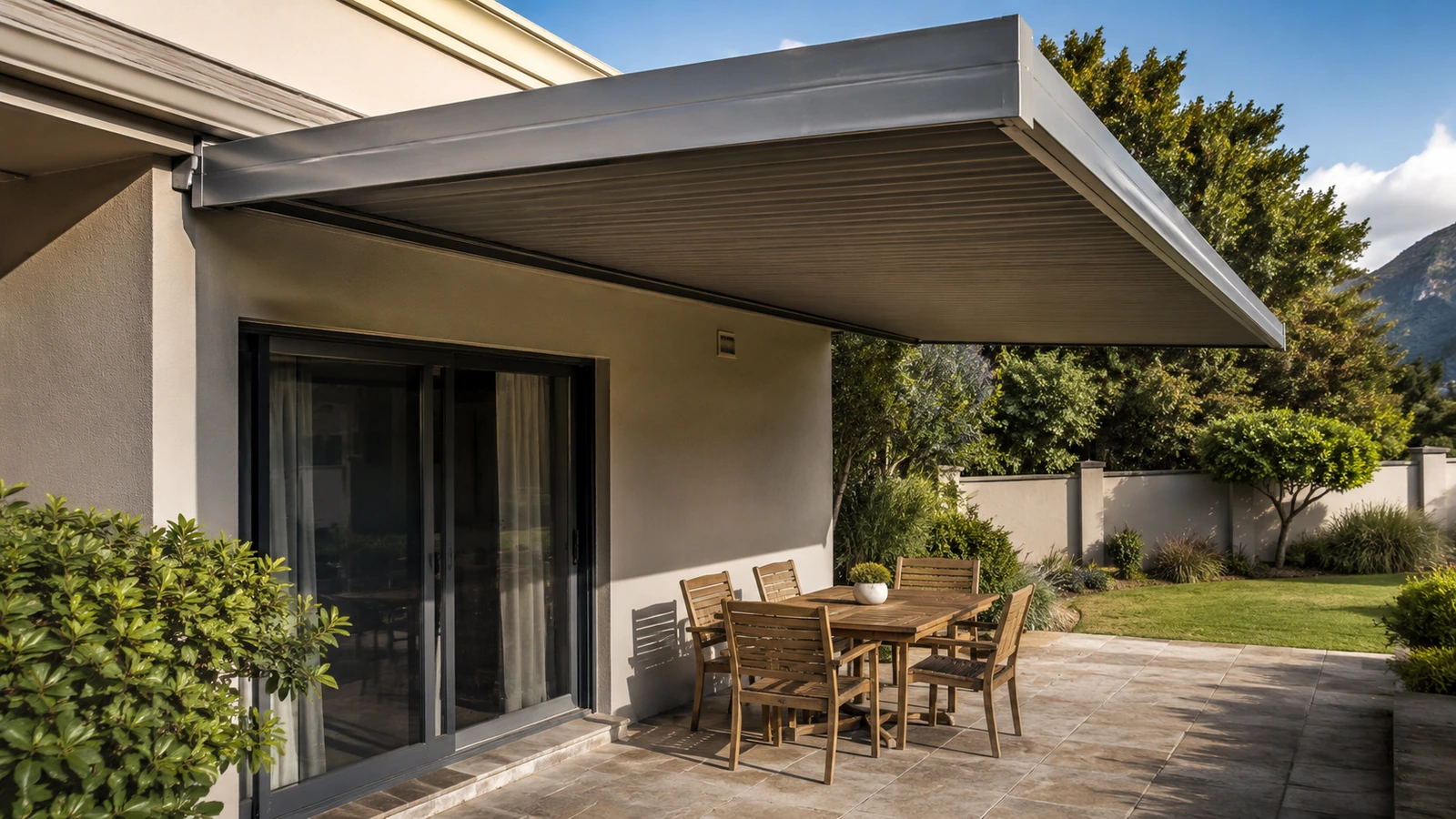 Signed awning guarantee document alongside a completed aluminium patio roof
